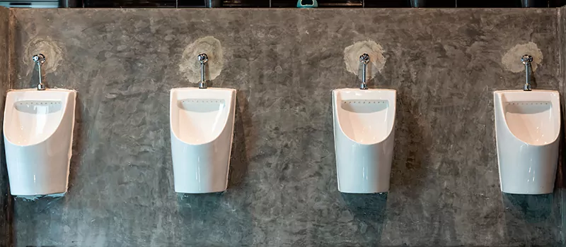 Wall-Mounted Urinal Installation in Yorkville, Toronto