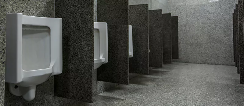 Urinal Divider Installation in Yorkville, Toronto